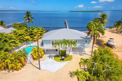 Welcome to an exquisite open-water retreat in Big Pine Key, an - photo 46