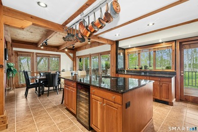 Perched high on 2 private acres, this home is an ideal full-time - photo 10