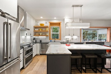 Step into refined living with this beautifully remodeled - photo 10