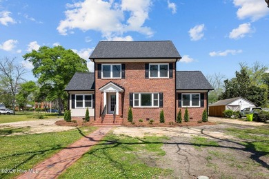 Step into this beautifully restored 1940's home, now with modern - photo 1