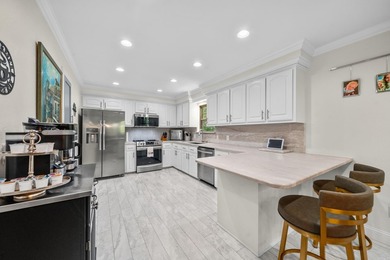 Enjoy lake living at its finest in this beautifully remodeled - photo 14