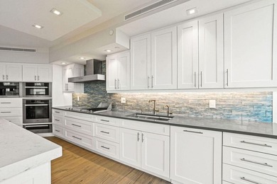 This beautiful unit has recently been renovated and offers a - photo 9