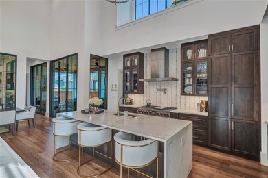 ELEVATED LIVING, EXPERTLY SCALED! This stunning SINGLE story - photo 6