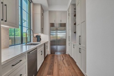 ELEVATED LIVING, EXPERTLY SCALED! This stunning SINGLE story - photo 8