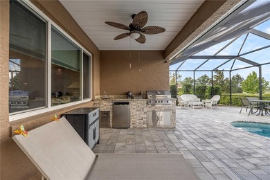 Wellington Pool Home with Waterfall, Outdoor Kitchen & Unmatched - photo 32
