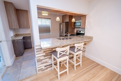 Welcome to this beautifully updated 2-bedroom, 2-bath garden - photo 19