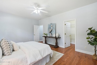 Welcome to Royal Pines! This spacious 5-bedroom, 3-bath with a 2 - photo 22