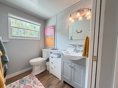 Welcome to this charming beachside retreat! Nestled in a highly - photo 22