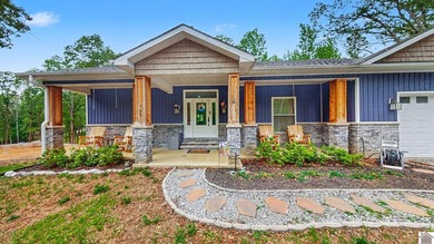 Tucked into a wooded setting just minutes from Kentucky Lake and - photo 29
