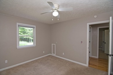 Discover serene living in this spacious four-bedroom - photo 35