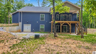 Tucked into a wooded setting just minutes from Kentucky Lake and - photo 38