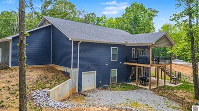 Tucked into a wooded setting just minutes from Kentucky Lake and - photo 39