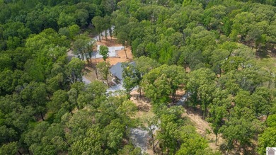 Tucked into a wooded setting just minutes from Kentucky Lake and - photo 40