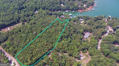 ACREAGE on the LAKE! Closest point of the Corp line is 39' from - photo 2