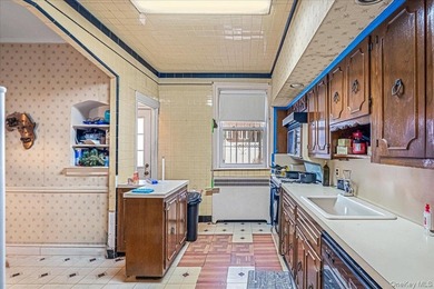 Welcome to 1404 E 49th Street, a semi-detached brick one-family - photo 8