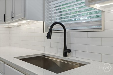 Fully renovated Windsor Forest brick ranch with modern updates - photo 12