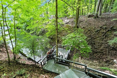 Beautiful view of Lamb Lake on 1.58 wooded acres. Nicely updated - photo 17