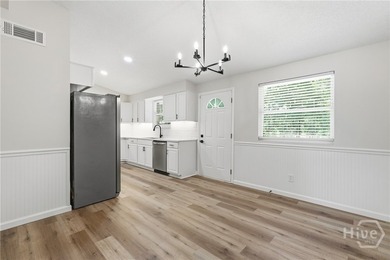Fully renovated Windsor Forest brick ranch with modern updates - photo 18