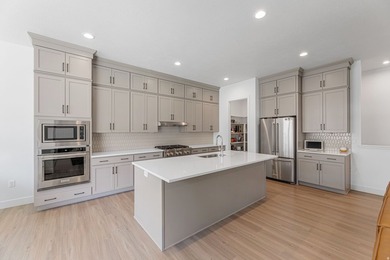 Experience a thoughtfully designed and expertly finished home in - photo 2