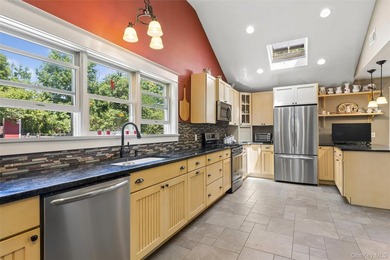 Nestled on a landscaped corner property in the heart of - photo 14