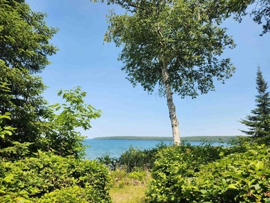 Set on approximately 220 feet of sandy Lake Superior shoreline - photo 50