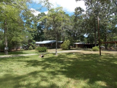Here it is! Your perfect lake area cottage in the popular Sam - Lake Home For Sale in Brookeland, Texas