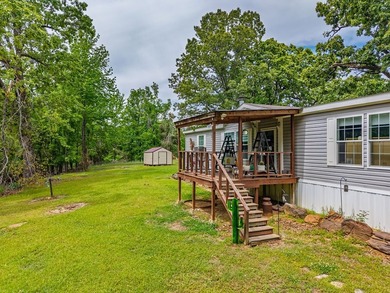 Well-maintained 3 bedroom, 2 bath mobile home on 74 acres. The - photo 6