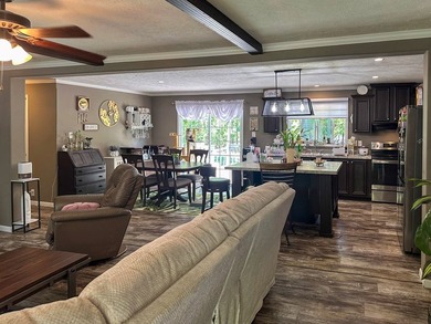 Well-maintained 3 bedroom, 2 bath mobile home on 74 acres. The - photo 8