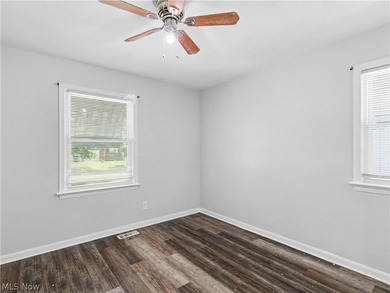 This 3-bedroom, 2-bath bungalow offers a bright, open feel with - photo 13