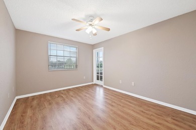Charming second-floor 2BR/2BA condo in Oakland Forest with - photo 11