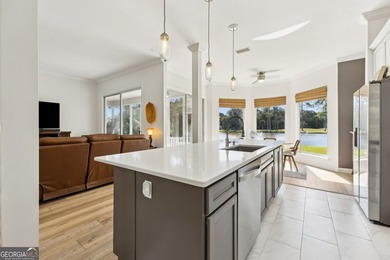 THIS BEAUTIFULLY UPDATED THREE-BEDROOM HOME IN OSPREY COVE IS - photo 17