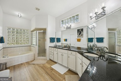 THIS BEAUTIFULLY UPDATED THREE-BEDROOM HOME IN OSPREY COVE IS - photo 29