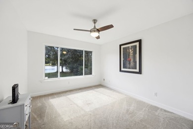 THIS BEAUTIFULLY UPDATED THREE-BEDROOM HOME IN OSPREY COVE IS - photo 31
