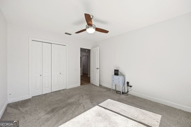 THIS BEAUTIFULLY UPDATED THREE-BEDROOM HOME IN OSPREY COVE IS - photo 32