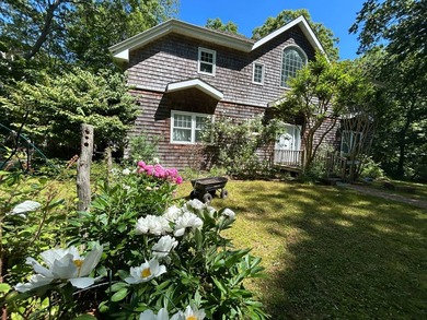 Nestled on the edge of Sag Harbor Village within the celebrated - photo 16
