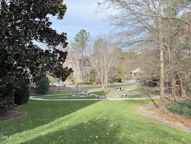 Gorgeous Hilltop Condo end unit overlooking the trees! Refined