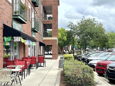 Gorgeous Hilltop Condo end unit overlooking the trees! Refined