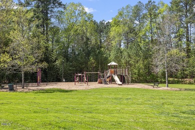 Gorgeous Hilltop Condo end unit overlooking the trees! Refined