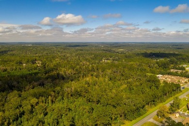 Located in the city limits of Quincy with over 500ft of highway - photo 5