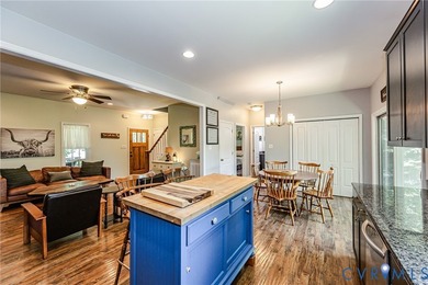 This beautiful lakefront home on over an acre features an open - photo 15