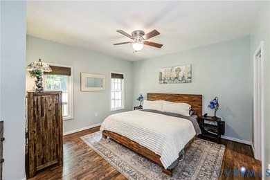 This beautiful lakefront home on over an acre features an open - photo 17
