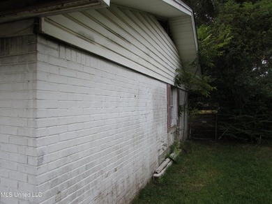 Great location for this 4/2 brick home. Has a newer roof but the - photo 19