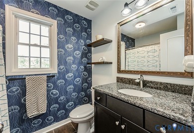 This beautiful lakefront home on over an acre features an open - photo 27