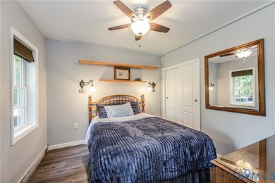 This beautiful lakefront home on over an acre features an open - photo 36