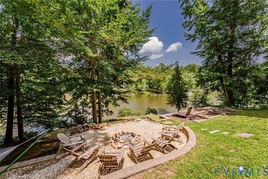 This beautiful lakefront home on over an acre features an open - photo 48