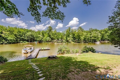 This beautiful lakefront home on over an acre features an open - photo 49