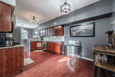 Welcome to this beautifully UPDATED END-UNIT townhome in the - photo 12