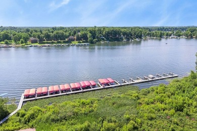 Nature's Cove is a gated community on beautiful Paw Paw Lake. As - photo 22