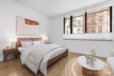 Welcome to **211 East 13th Street, Unit 1C** - a beautifully - photo 2