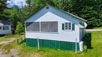 Charming 1953 Cottage in a Prime Long Lake Location! Step back - photo 3